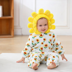 Baby sitting in the sunflower romper, front view
