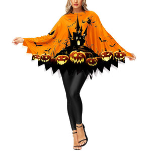 Orange poncho printed with a black castle, bats and a row of pumpkins