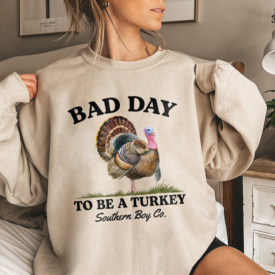 Bad Day To Be A Turkey Sweatshirt | Funny Thanksgiving Graphic Tee | Premium Cotton Blend Crewneck | Unisex Holiday Humor Gift For Men Women