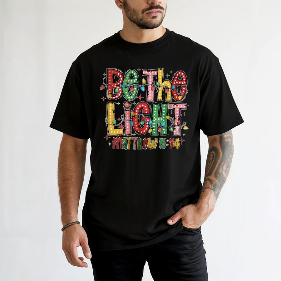 Be The Light T-Shirt | Matthew 5:14 Christmas Bible Verse Graphic | 100% Cotton Premium Tee | Christian Religious Gift for Women and Men