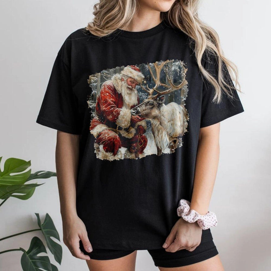 Santa Claus and Reindeer T-Shirt | Realistic Christmas Winter Scene | Premium Soft Cotton Graphic Tee | Holiday Gift for Men and Women
