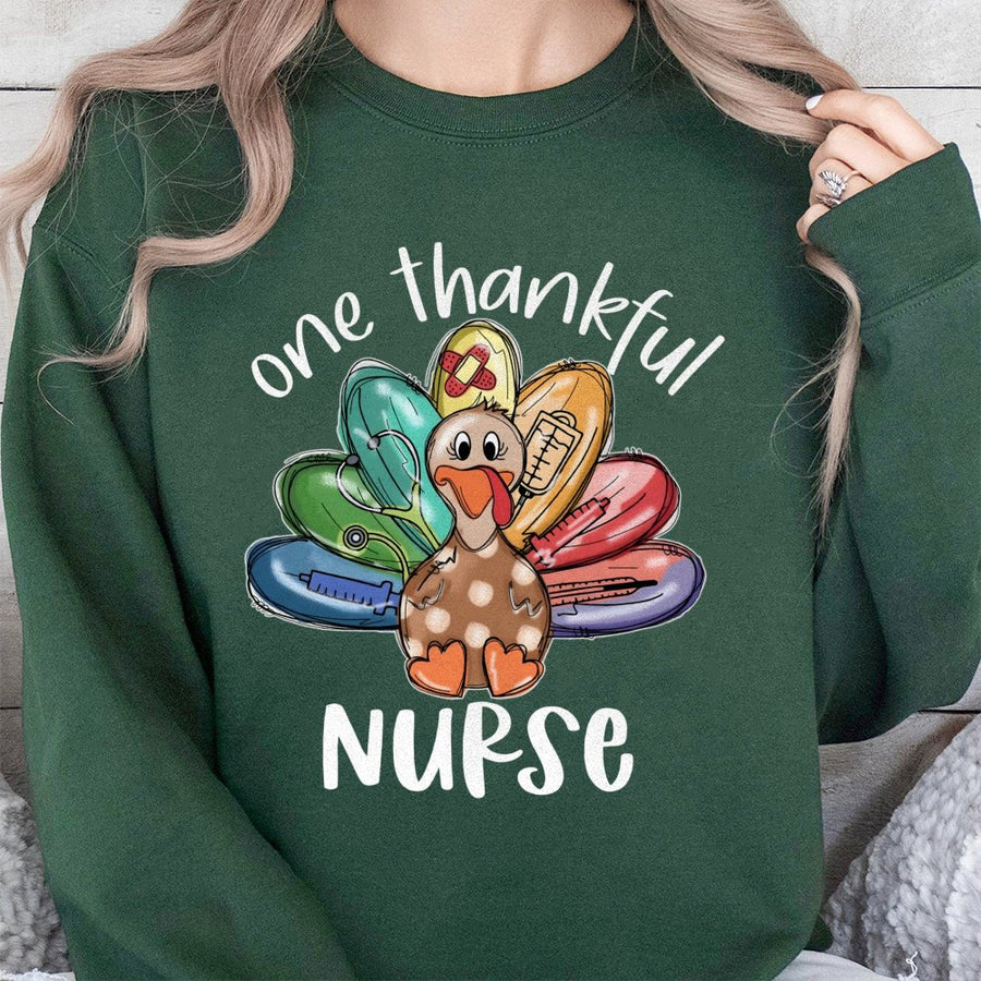 One Thankful Nurse Sweatshirt | Thanksgiving Turkey Medical Graphic | Soft Cotton Blend Crewneck | Gift for Registered Nurse & Nursing Student
