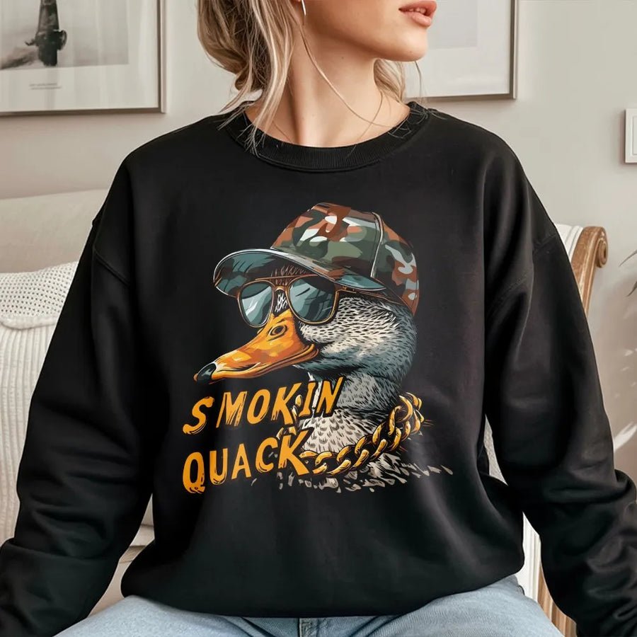 Smokin Quack Sweatshirt | Funny Duck with Camo Hat Design | Premium Cotton-Poly Blend | Humorous Graphic Gift for Duck Hunters and Bird Lovers