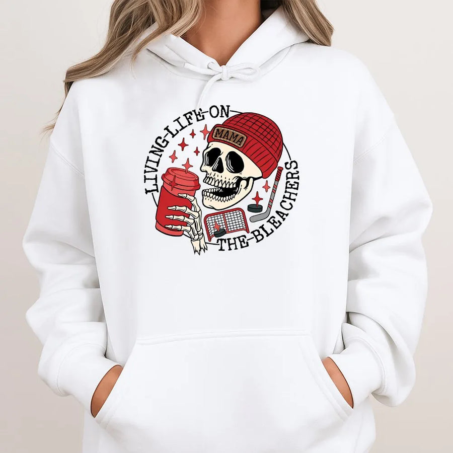 Living Life On The Bleachers Hoodie | Hockey Mom Skull Graphic | Premium Cotton Blend | Gift For Hockey Moms & Sports Fans