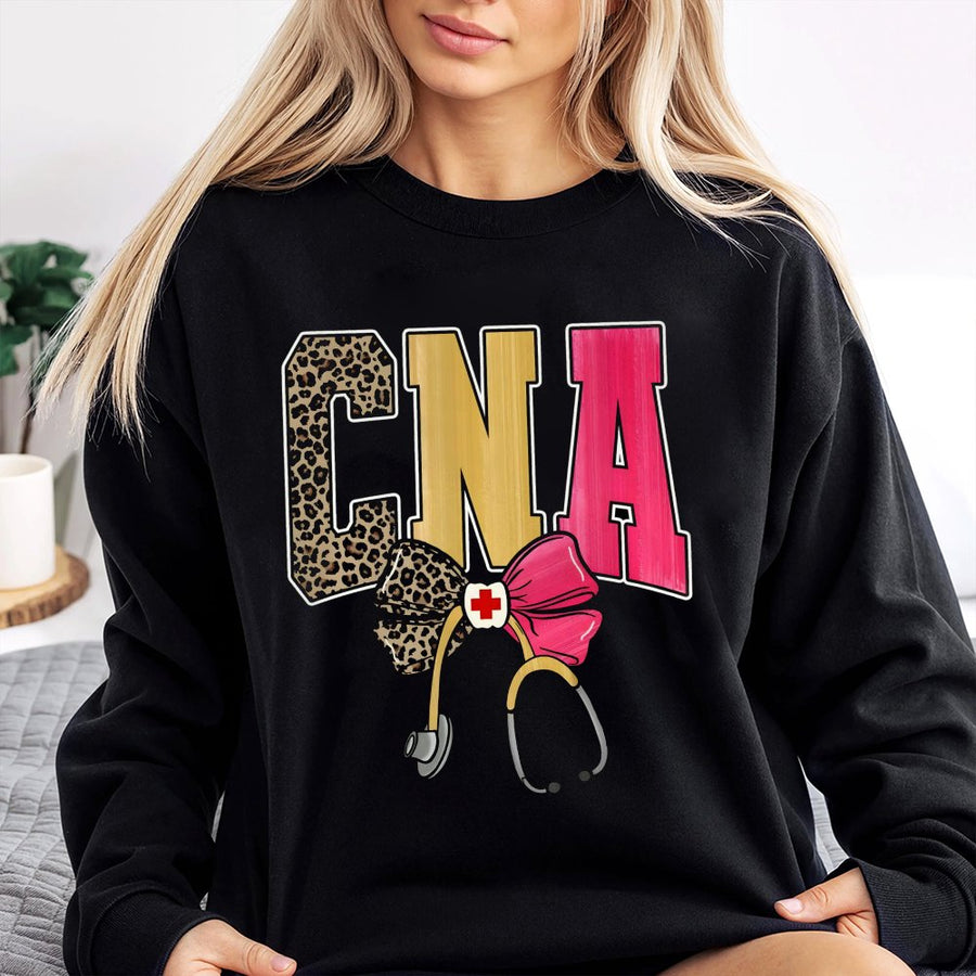 CNA Sweatshirt | Leopard Print Nursing Assistant Graphic with Bow and Stethoscope | Cotton Polyester Blend | Nursing School Gift for CNA Graduation