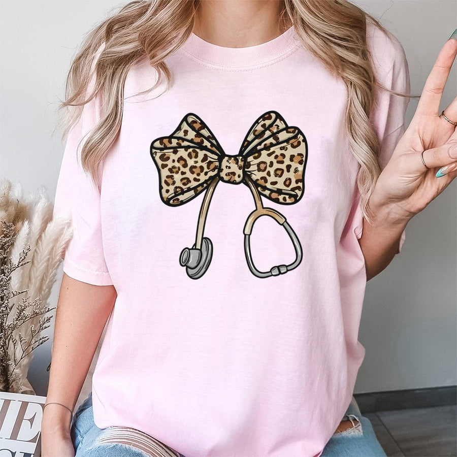 Nurse Leopard Bow Stethoscope T-Shirt | Coquette Aesthetic Medical Design | Premium Cotton Graphic Tee | Nurse Appreciation Gift for Healthcare Workers