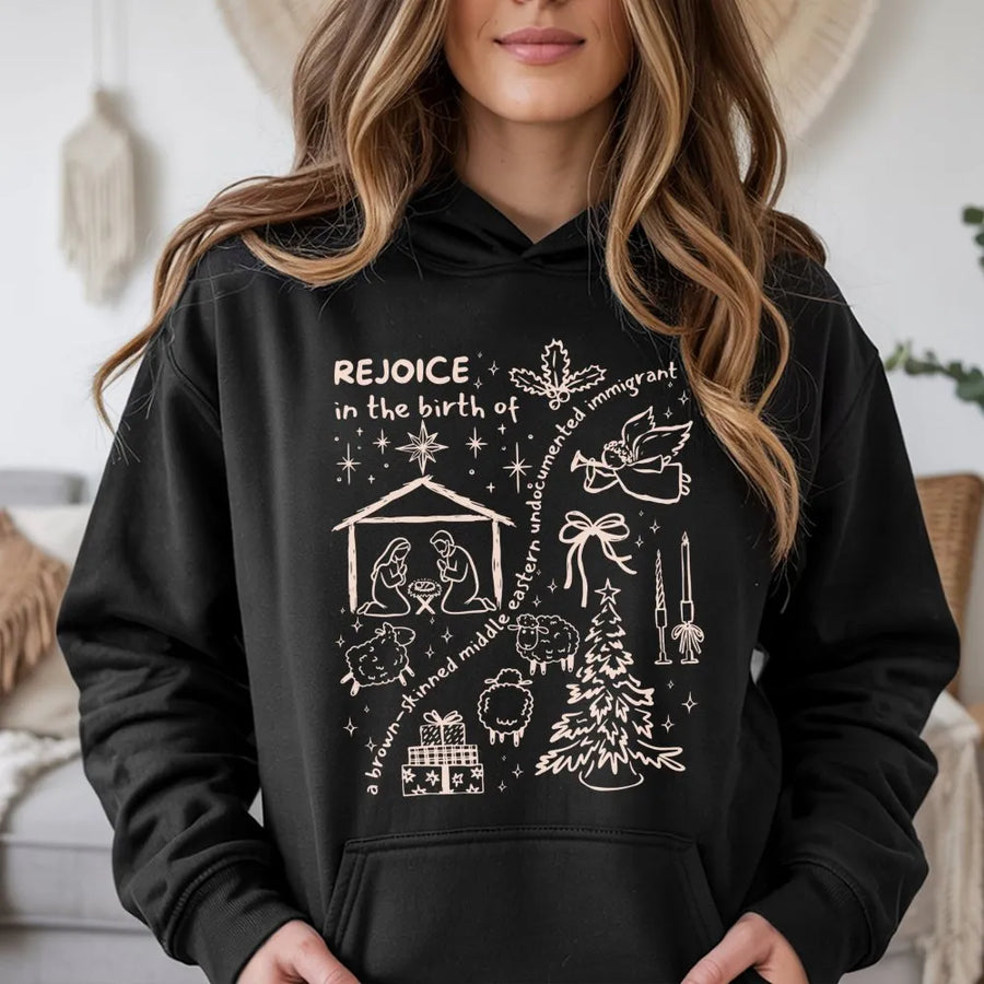 Rejoice In The Birth Of A Brown-Skinned Undocumented Immigrant Hoodie | Christmas Graphic Design | Premium Cotton Blend | Unisex Holiday Gift