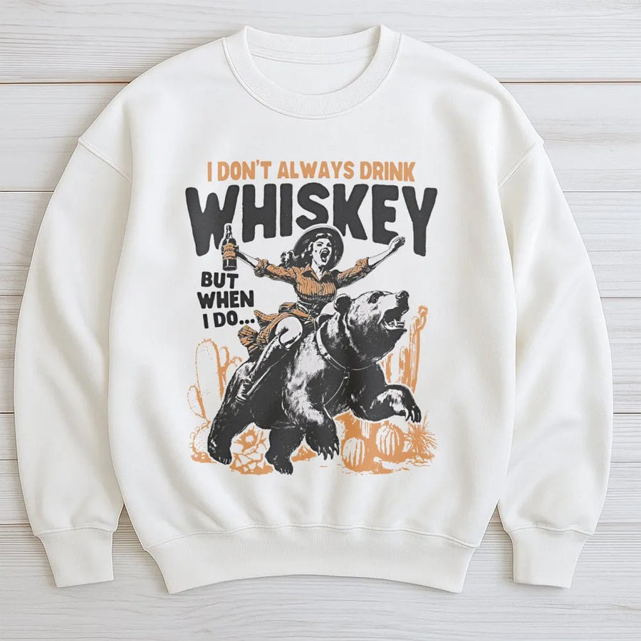 Whiskey Drinking Graphic Sweatshirt | Cowboy Girl Riding Bear Western Design | Premium Cotton Blend | Funny Gift for Whiskey Lovers and Men Women