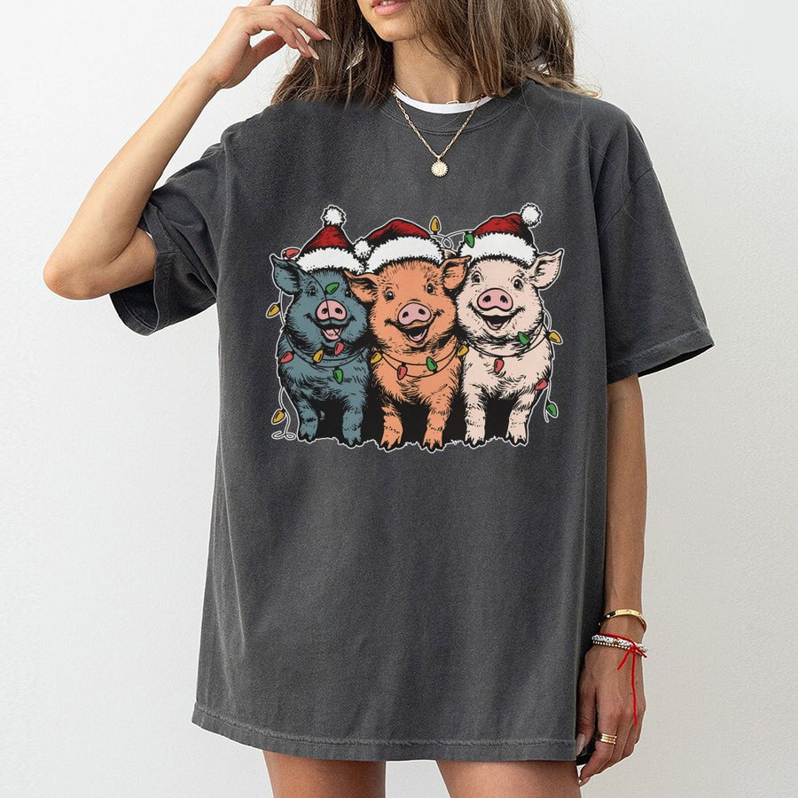 Christmas Pigs T-Shirt | Funny Farm Animals in Santa Hats with Holiday Lights | 100% Cotton Premium Tee | Unique Gift for Pig Lovers & Farmers