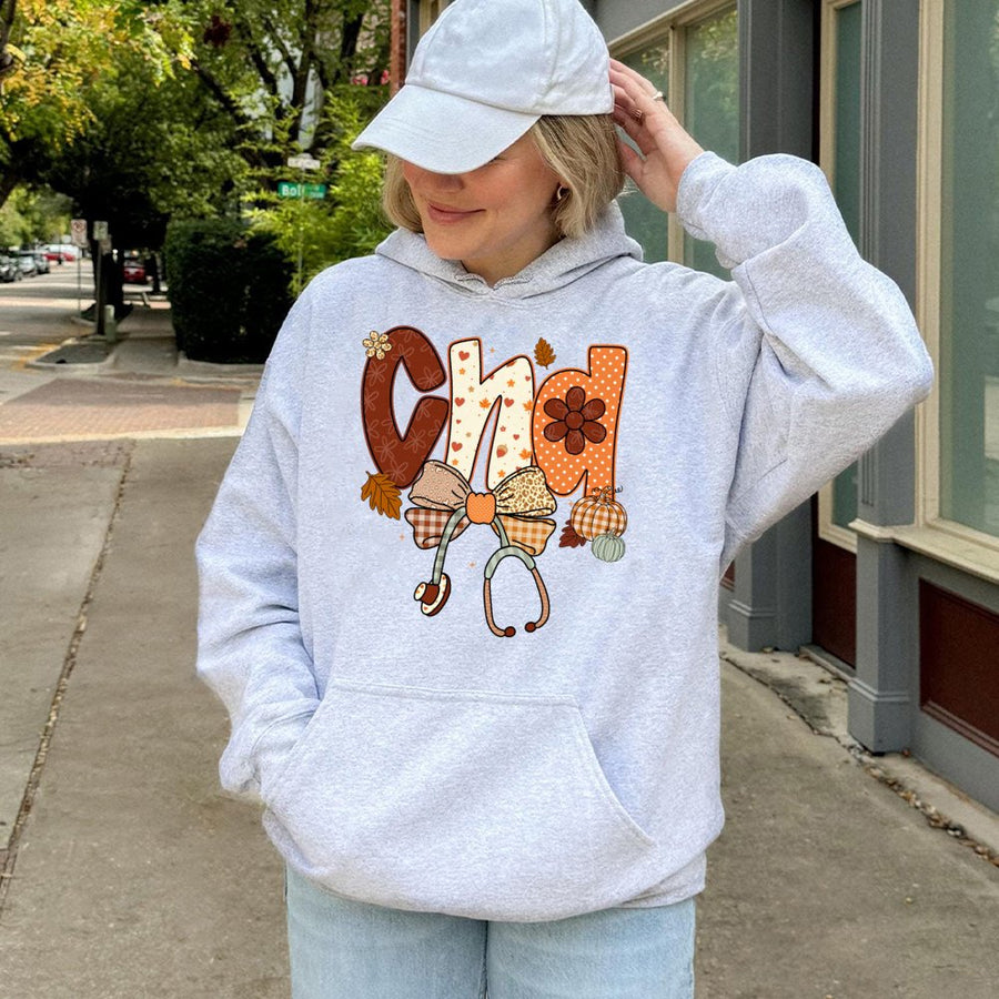 CNA Fall Nurse Hoodie | Preppy Pumpkin Aesthetic Stethoscope Design | Cotton-Polyester Premium Blend | Cute Autumn Nursing School Gift