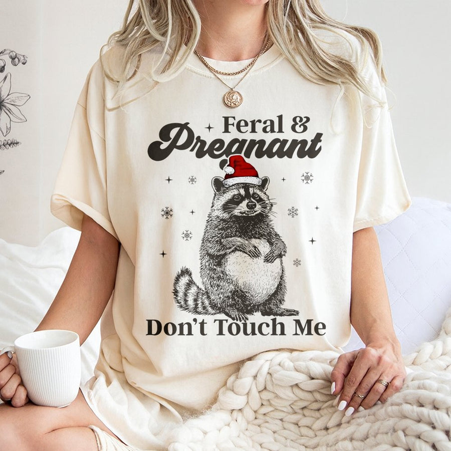 Feral and Pregnant T-Shirt | Funny Christmas Raccoon Graphic | 100% Cotton Premium Quality | Maternity Holiday Humor Gift for Expecting Mom