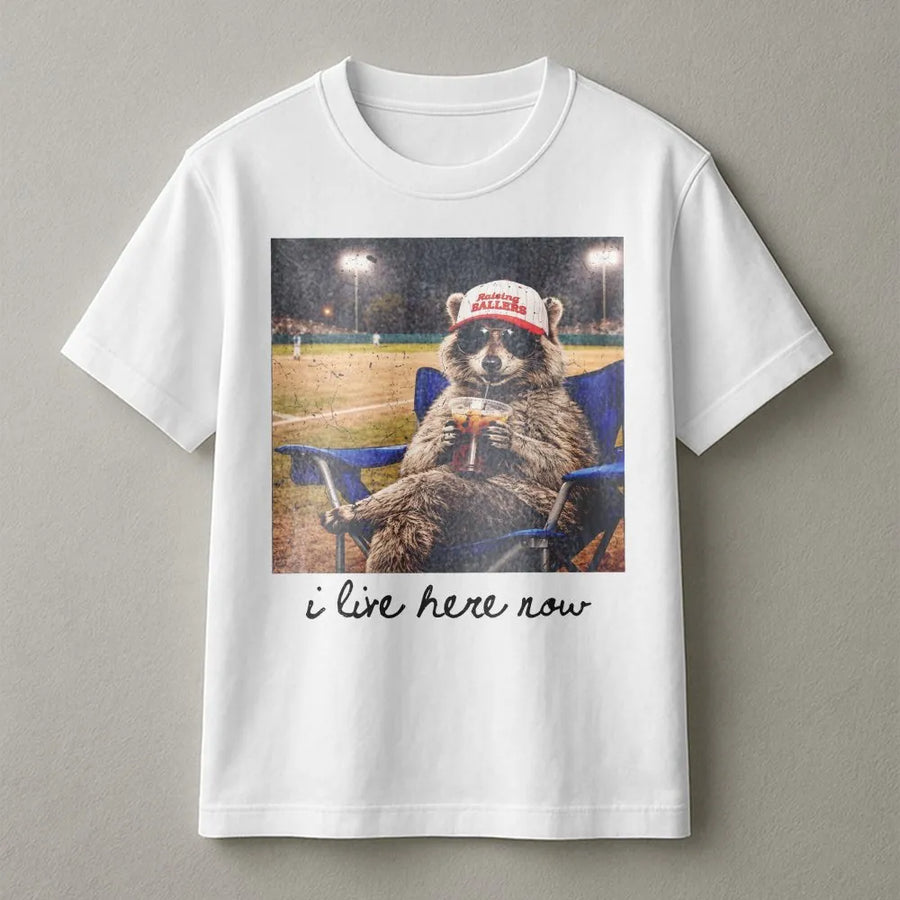 Funny Raccoon Baseball Mom T-Shirt | I Live Here Now Vintage Ballpark Graphic | Premium Cotton Blend | Gift for Softball Mama