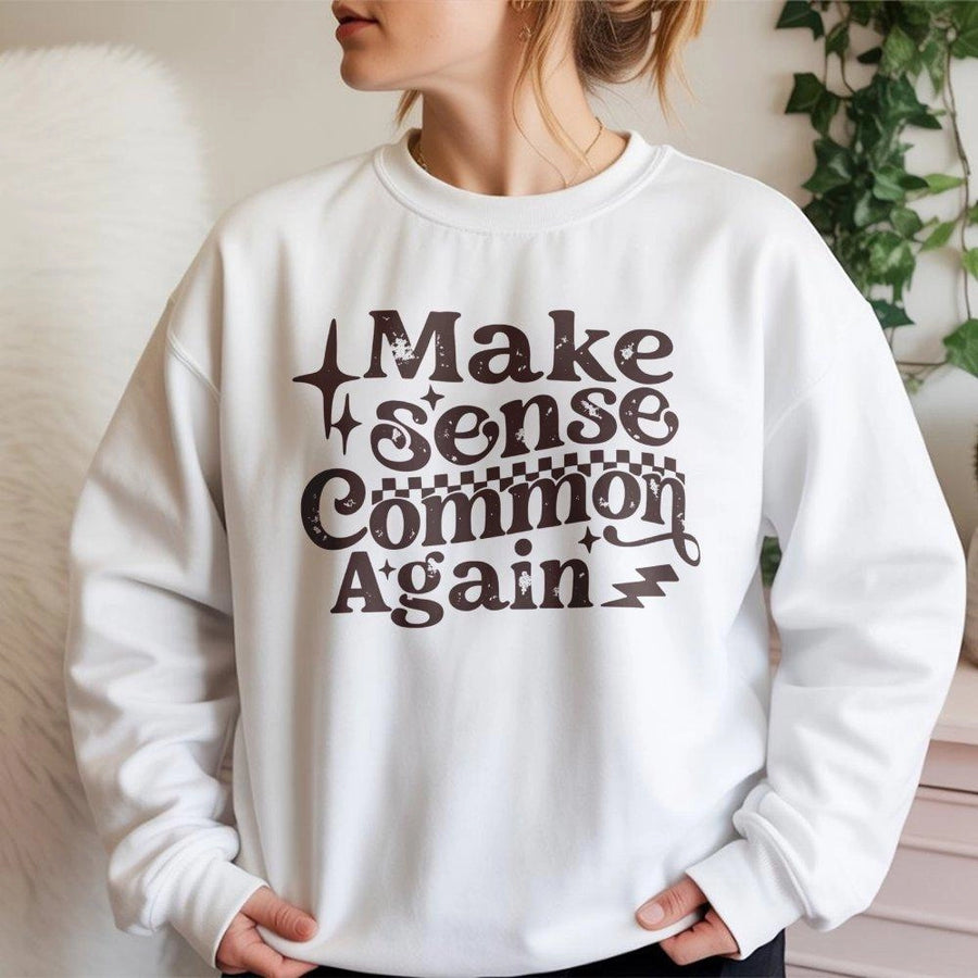 Make Sense Common Again Sweatshirt | Retro Typography Graphic Tee | Premium Cotton Blend Crewneck | Comfortable Unisex Gift for Men and Women