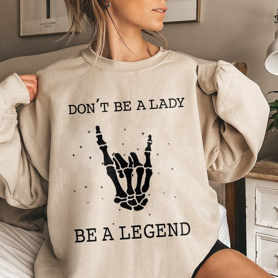 Dont Be A Lady Be A Legend Sweatshirt | Skeleton Rock Hand Graphic | Premium Cotton Blend | Empowering Gift For Women And Girls