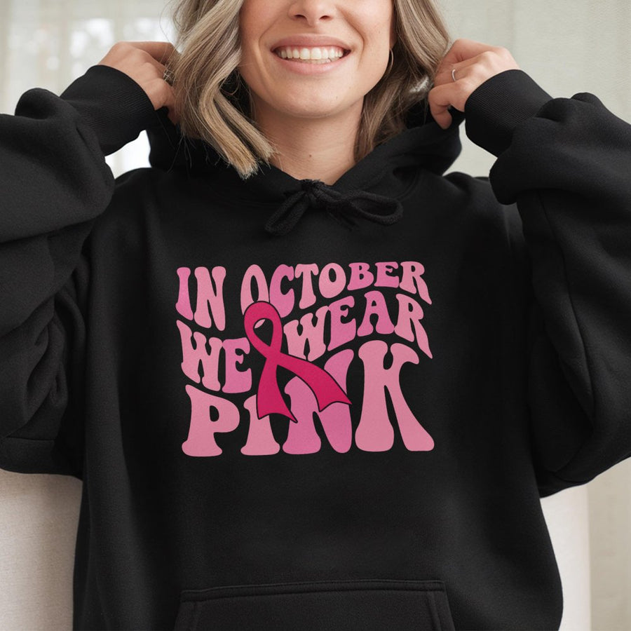 In October We Wear Pink Hoodie | Breast Cancer Awareness Ribbon Graphic | Soft Cotton-Poly Blend | Unisex Support Gift for Women and Survivors