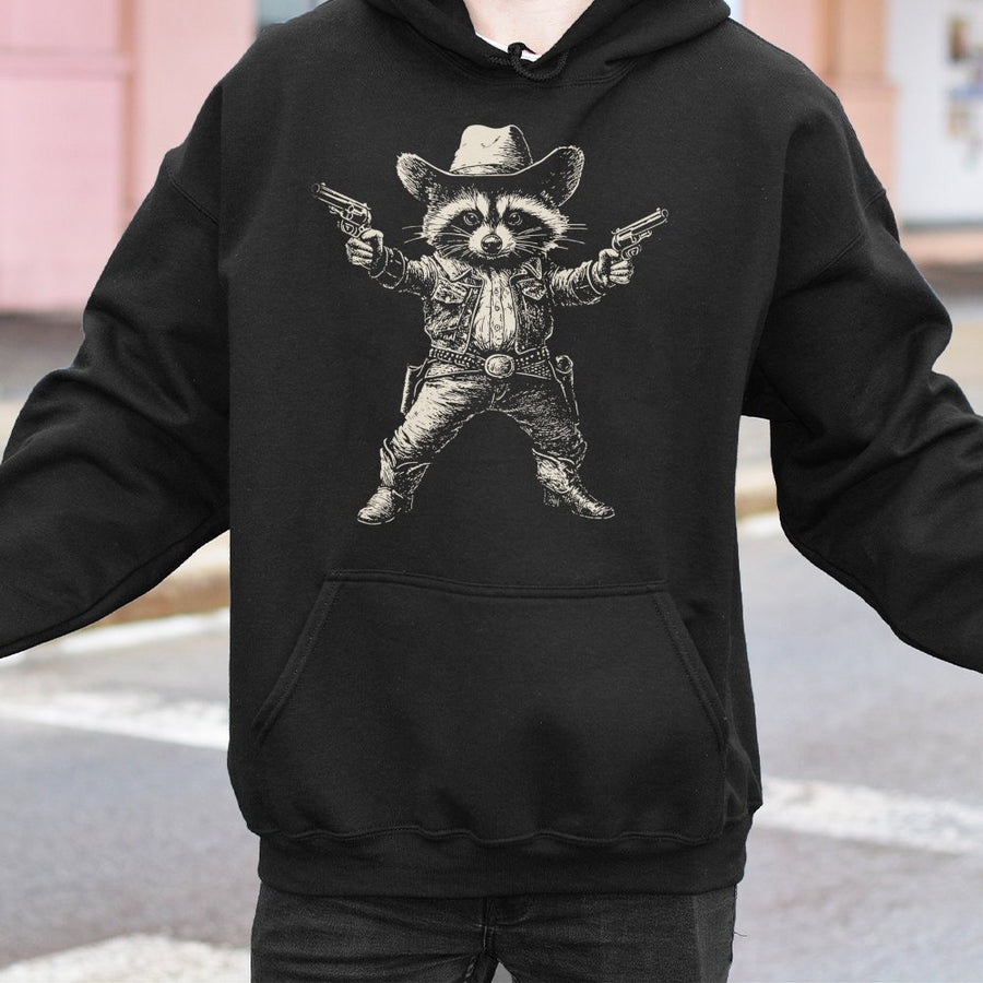 Cowboy Raccoon Hoodie | Western Outlaw Animal Graphic Design | Premium Cotton-Blend | Funny Wildlife Lover Gift for Men and Women