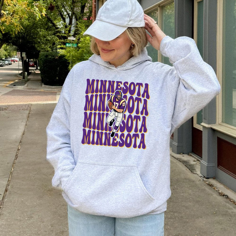 Minnesota Repeating Retro Text With A Minnesota Vikings Football Player Graphic Hoodie