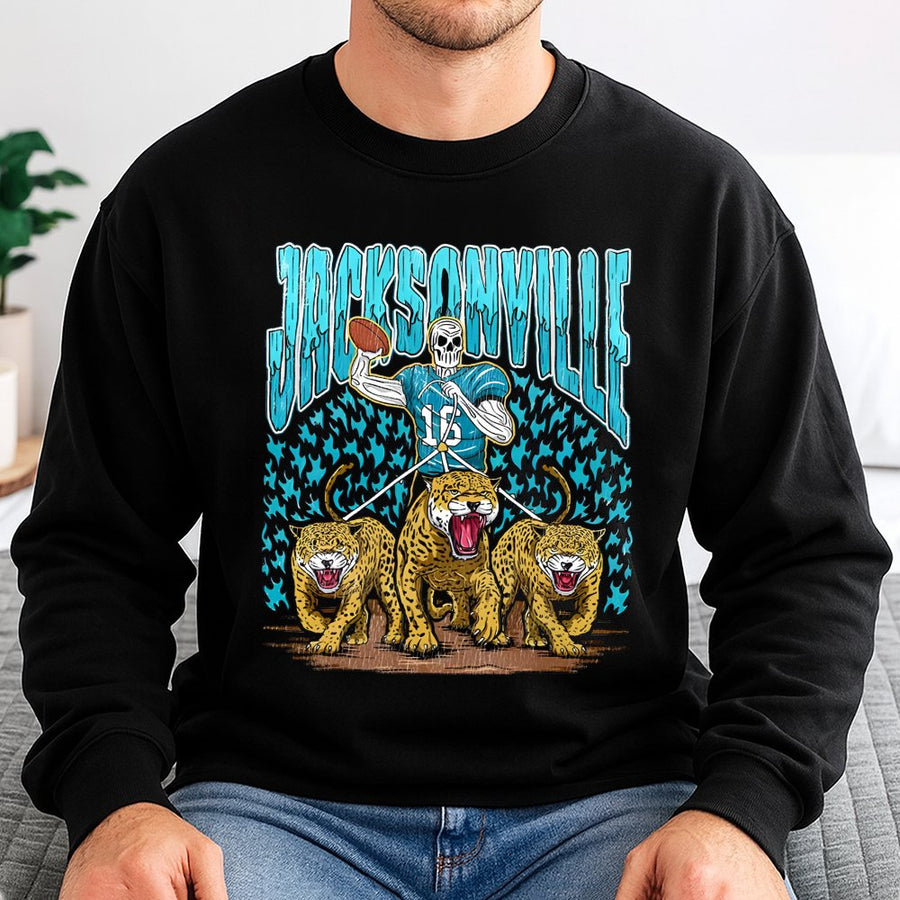 Jacksonville With A Skeleton Football Player Holding A Football And Three Jaguars Sweatshirt