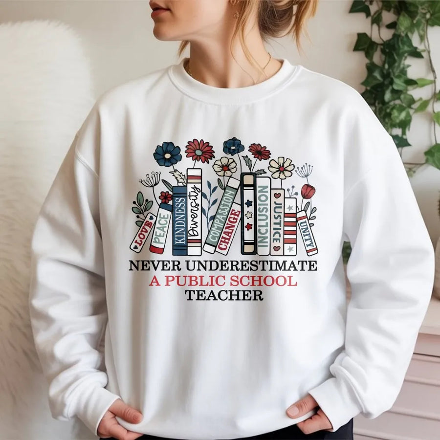 Never Underestimate A Public School Teacher Sweatshirt | Floral Book Stack Design | Soft Cotton Blend | Premium Back To School Gift For Educators