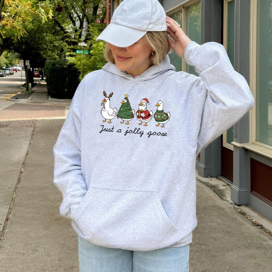 Just A Jolly Goose Hoodie | Cute Christmas Duck Graphic Sweatshirt | Premium Cotton Blend Pullover | Festive Holiday Gift for Animal Lovers