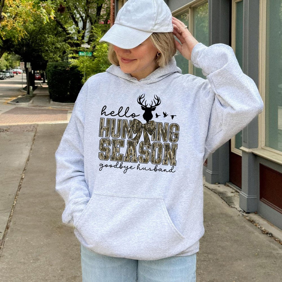 Hello Hunting Season Goodbye Husband Hoodie | Camo Coquette Bow Graphic | Premium Cotton Blend | Funny Hunter Wife Gift for Fall