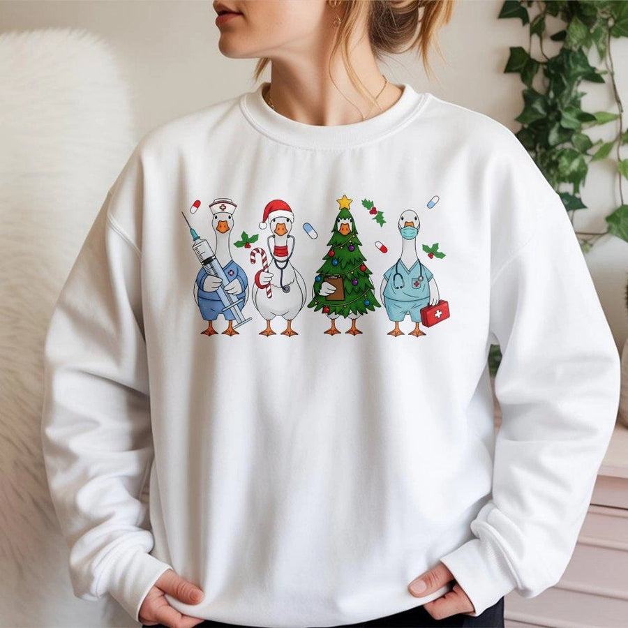 Christmas Nurse Sweatshirt | Funny Goose Medical Holiday Design | Cotton-Blend Premium Crewneck | Cute RN Gift for Nursing Students & Doctors