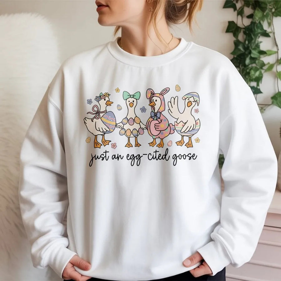 Just An Egg-Cited Goose Sweatshirt | Cute Easter Duck Graphic | Premium Cotton Blend Crewneck | Funny Animal Lover Spring Gift