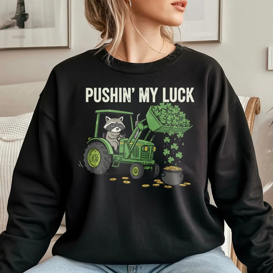 St Patrick's Day Raccoon Sweatshirt | Funny Tractor Graphic Design | Premium Cotton Blend | Gift for Farmers and Animal Lovers