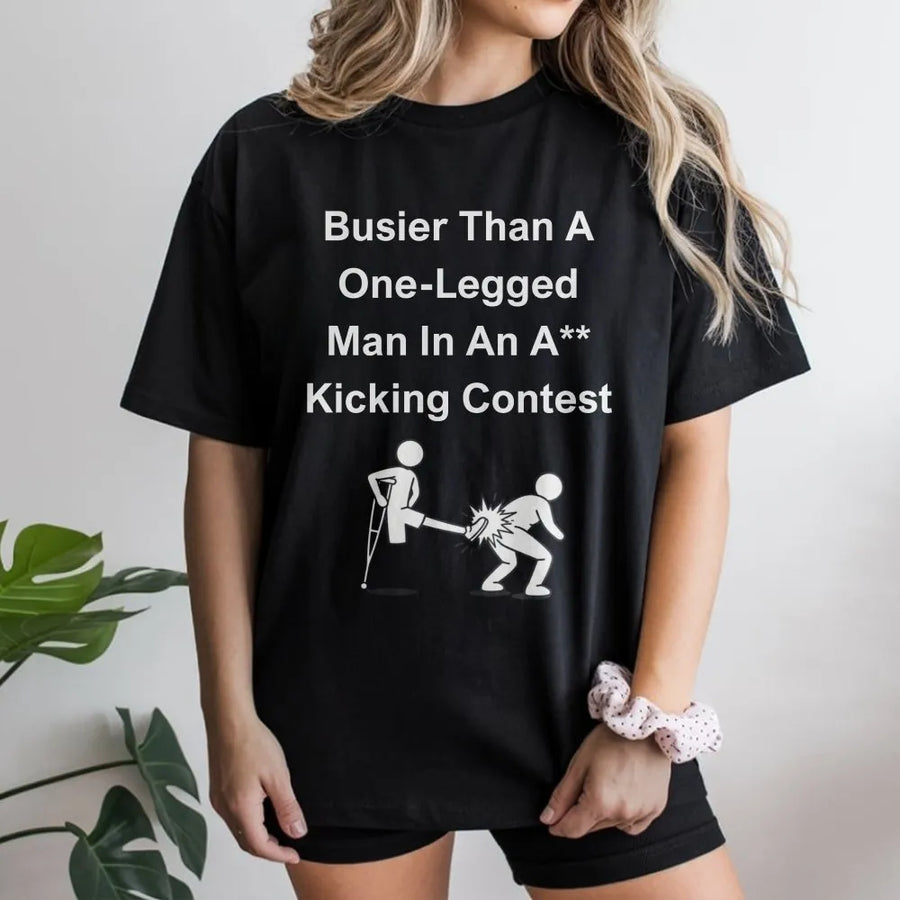 Funny Saying T-Shirt | Busier Than A One-Legged Man Kicking Contest | Soft Cotton Blend Pullover | Humorous Gag Gift for Adults