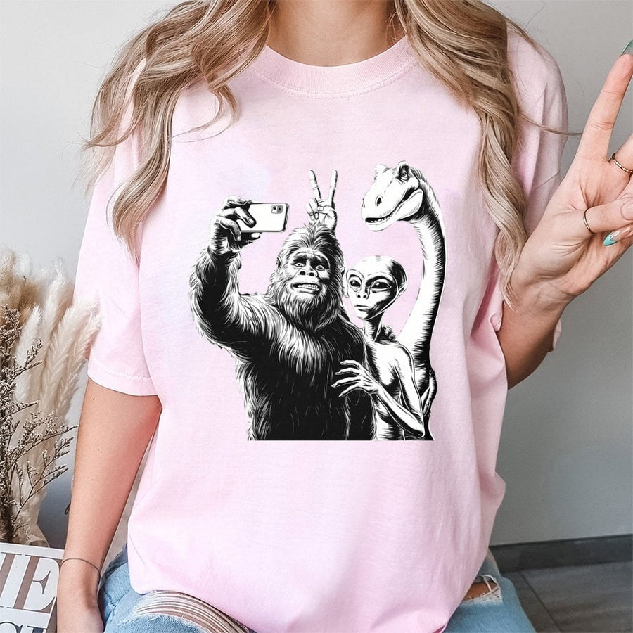 Bigfoot Alien Selfie Graphic T-Shirt | Funny Paranormal Cryptid Design | 100% Cotton Premium Quality | Unisex Gift for Sci-Fi and UFO Lovers