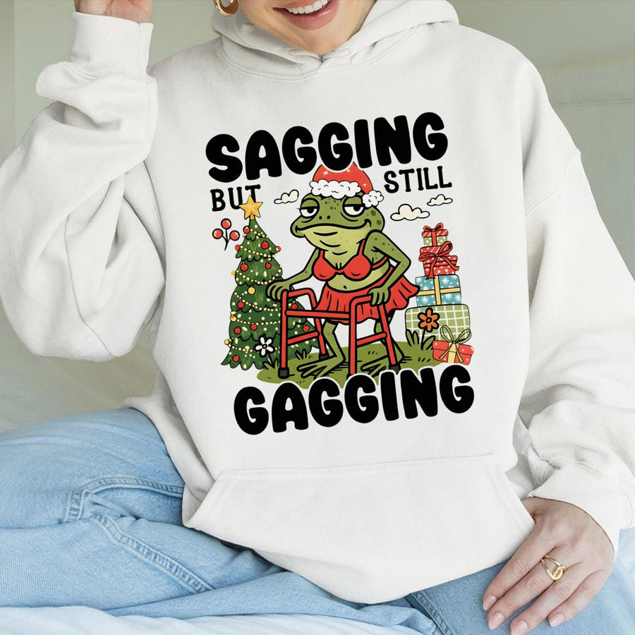 Funny Christmas Hoodie | Sagging But Still Gagging Frog Meme | Premium Cotton Blend Sweatshirt | Rude Adult Humor Holiday Gift for Friends