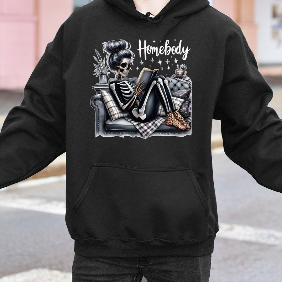 Homebody Skeleton Hoodie | Reading Book Skeleton Graphic | Premium Cotton Blend Sweatshirt | Cozy Gift for Book Lovers and Introverts