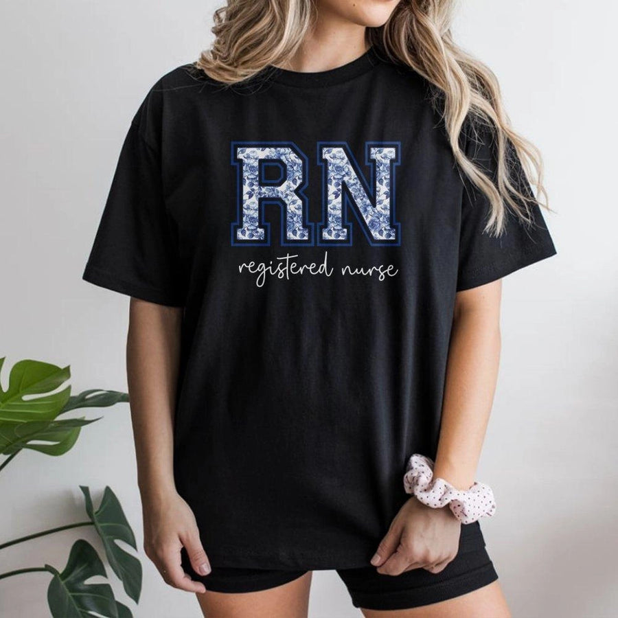RN Registered Nurse T-Shirt | Blue Toile Floral Lettering Design | Premium Cotton Apparel | Gift for Nursing Student Graduation or Nurse Appreciation
