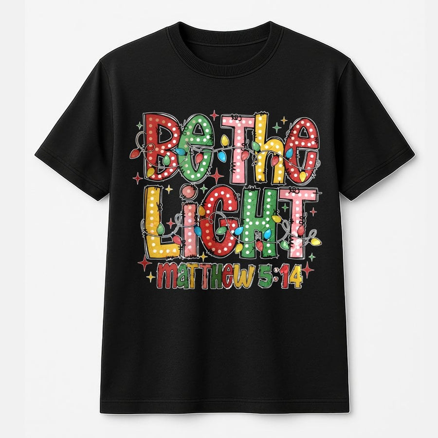 Be The Light Matthew 5:14 T-Shirt | Christmas Lights Graphic Design | 100% Premium Cotton | Faith-Based Christian Holiday Gift For Women