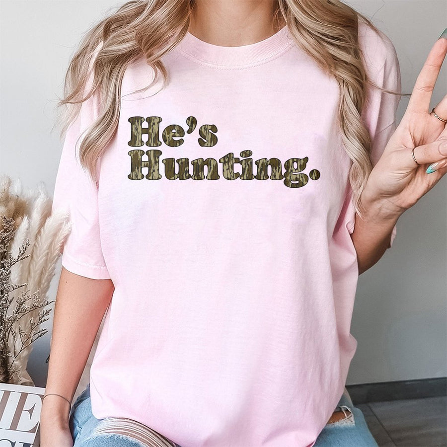 He's Hunting T-Shirt | Retro Camo Lettering Graphic Tee | Premium 100% Cotton | Funny Gift for Hunter's Wife or Girlfriend