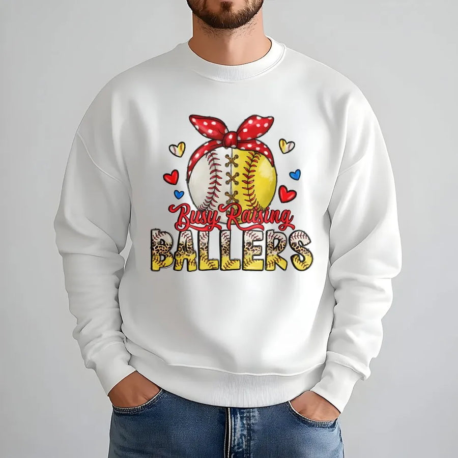 Busy Raising Ballers Sweatshirt | Baseball Softball Mom Graphic Design | Premium Cotton Blend | Game Day Gift for Baseball Mama