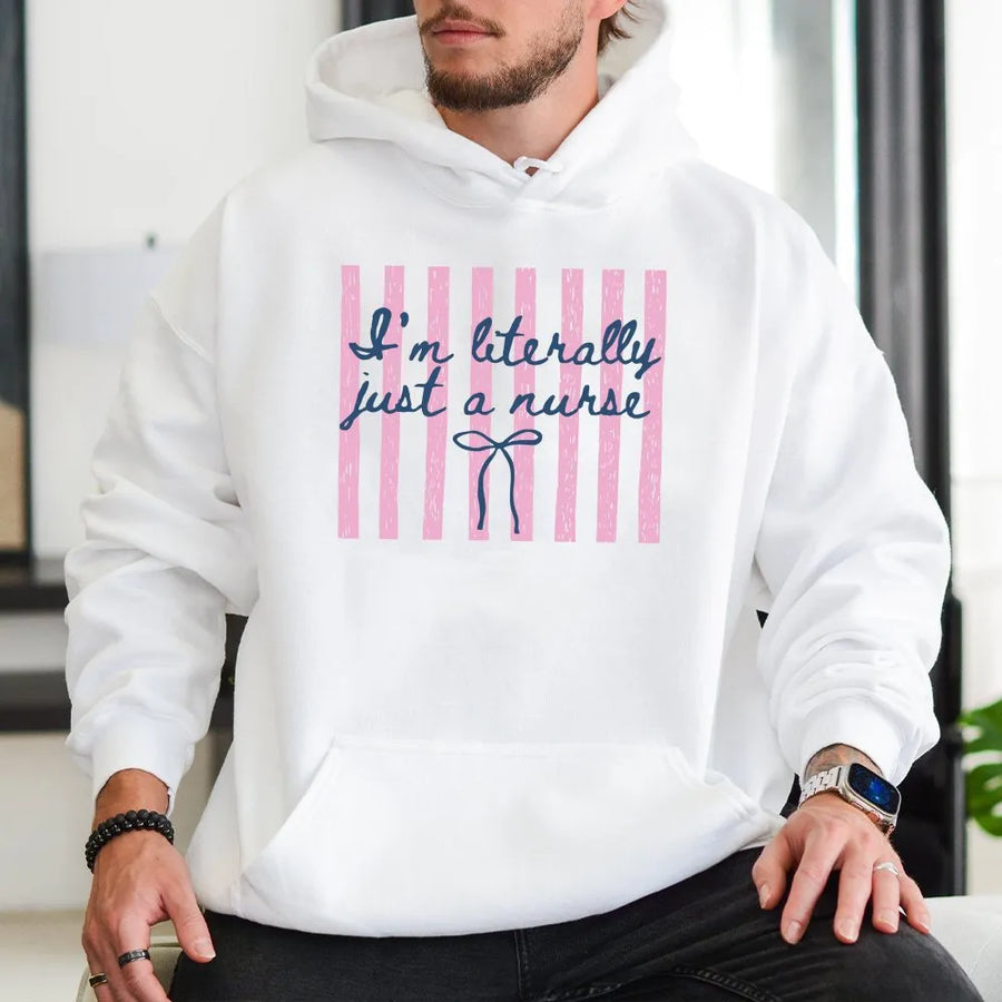 Coquette Nurse Hoodie | Preppy Pink Stripe Graphic | Soft Cotton Blend Sweatshirt | Funny Nurse Appreciation Week Gift for ICU, ER, RN