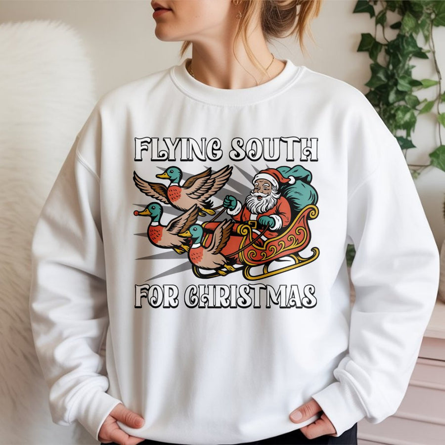 Flying South For Christmas Sweatshirt | Funny Duck Hunting Holiday Graphic | Premium Cotton Blend Unisex Crewneck | Unique Outdoor Gift For Him