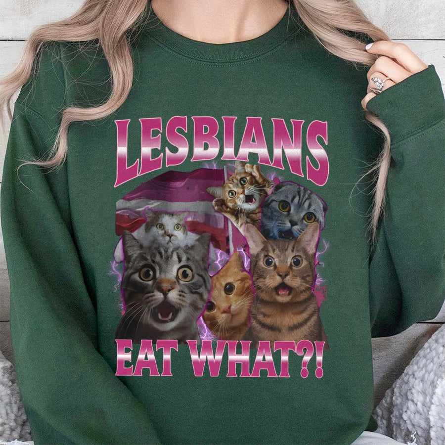 Lesbians Eat What Sweatshirt | Funny Cat Meme Graphic Tee | Vintage 90s Bootleg Style | Premium Unisex Pullover for LGBTQ Pride Gift