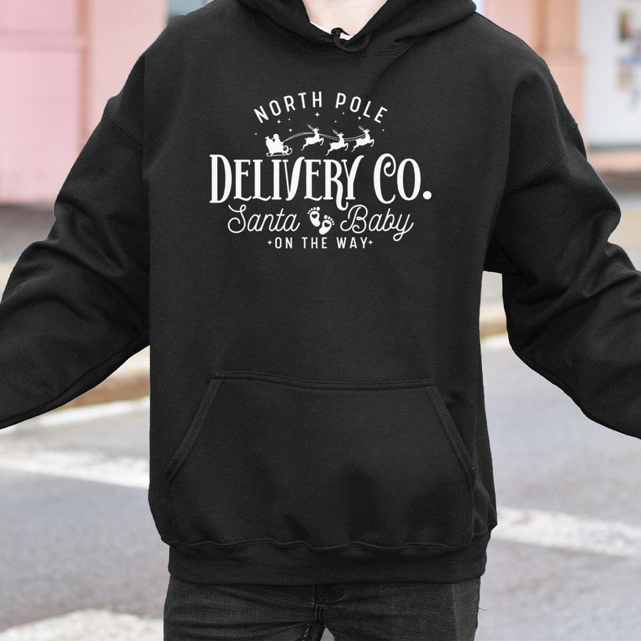 Christmas Pregnancy Announcement Hoodie | North Pole Delivery Co Design | Soft Cotton-Polyester Blend | Festive Expecting Mom Holiday Gift