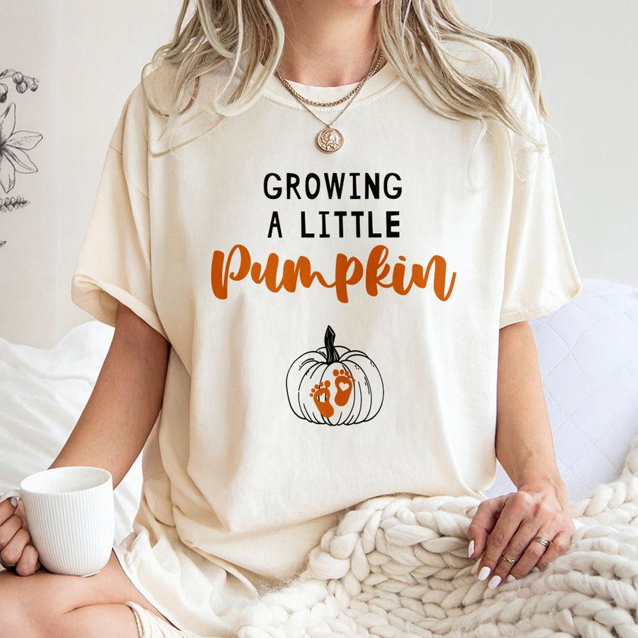 Growing A Little Pumpkin T-Shirt | Fall Pregnancy Announcement Graphic | 100% Cotton Premium Tee | Cute Thanksgiving Baby Reveal Gift For Mom
