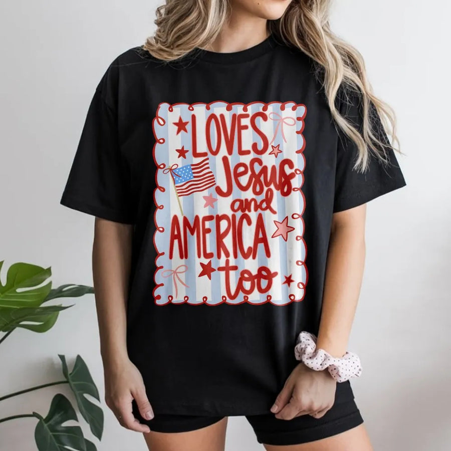 Loves Jesus And America Too T-Shirt | Patriotic Coquette Bow Graphic | Premium Soft Cotton | Christian Fourth Of July Gift For Her