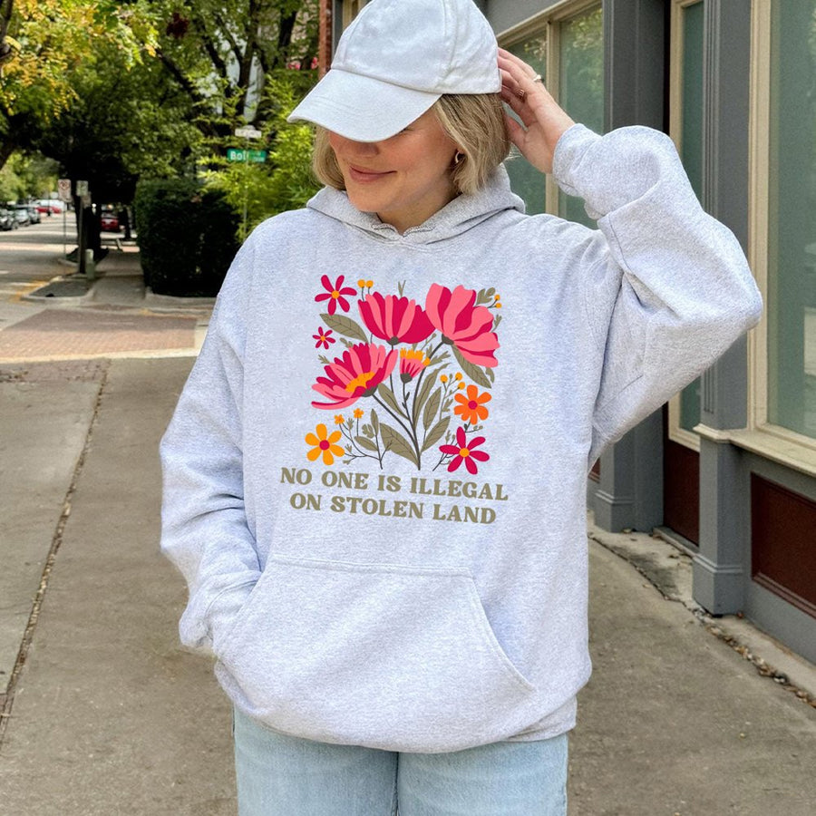 No One Is Illegal On Stolen Land Hoodie | Floral Social Justice Graphic | Premium Cotton-Poly Blend | Activist Protest Apparel For Men And Women