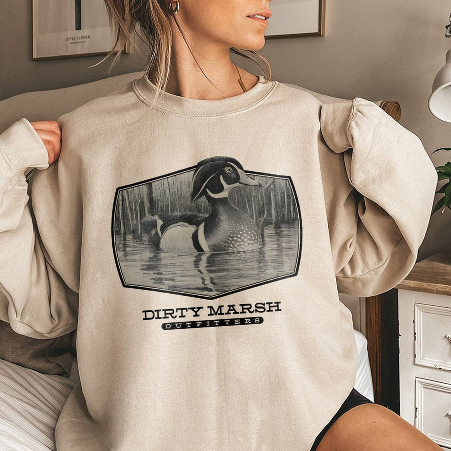 Wood Duck Sweatshirt | Dirty Marsh Wildlife Art Graphic | Premium Cotton Blend Crewneck | Gift for Hunters and Nature Lovers