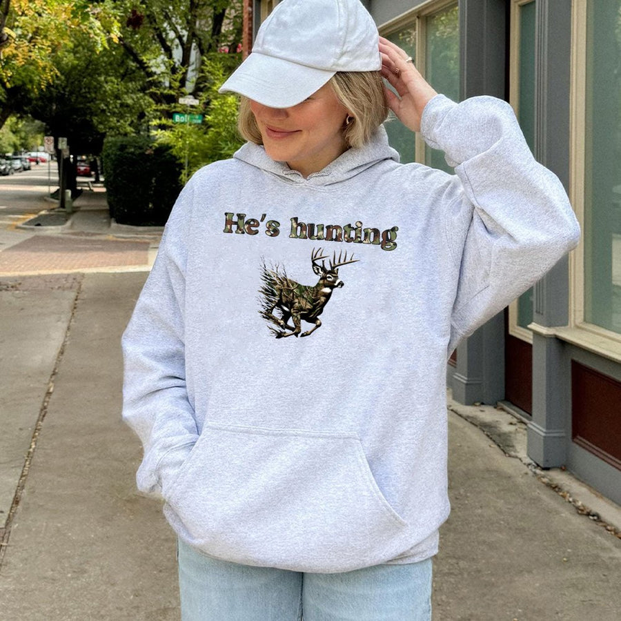He's Hunting Deer Hoodie | Camo Buck Wildlife Graphic | Premium Cotton-Poly Blend | Outdoorsman Gift for Hunter