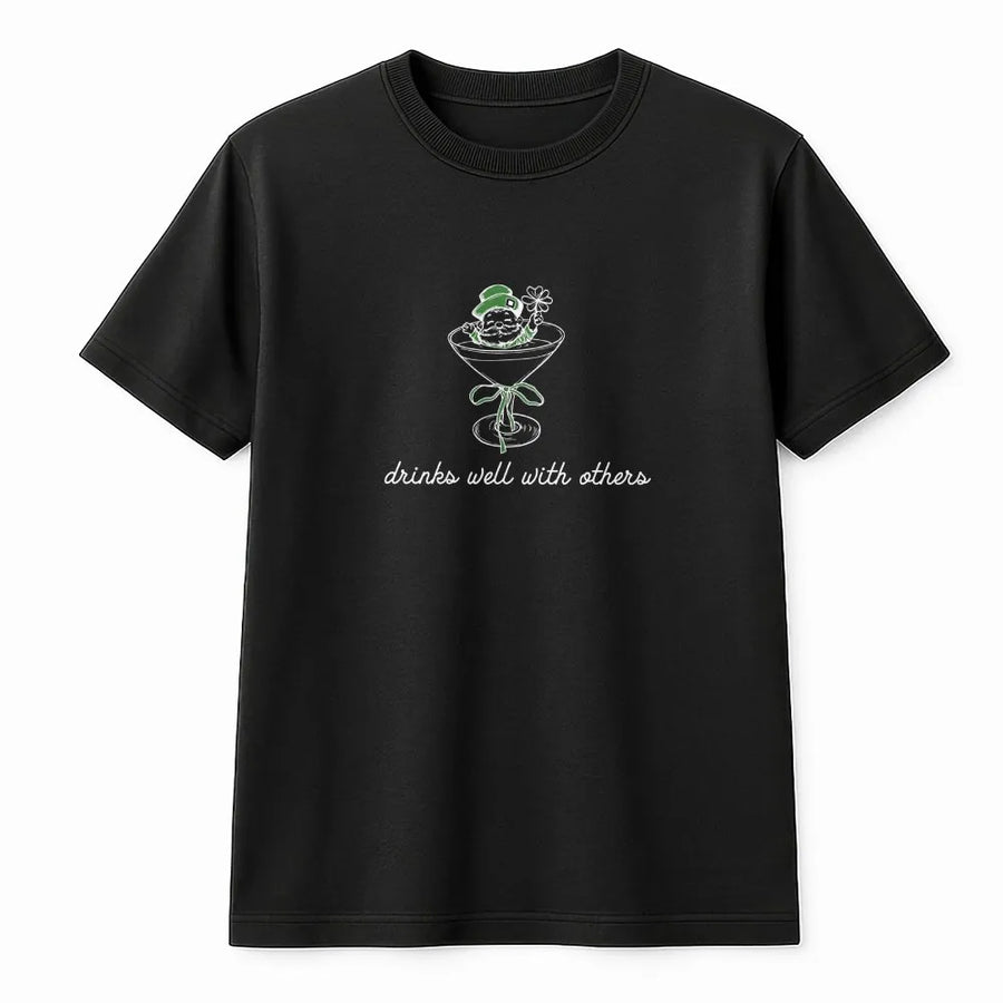 Drinks Well With Others T-Shirt | St. Patrick's Day Leprechaun Martini Graphic | Premium 100% Cotton Tee | Funny Irish Party Gift For Women And Men