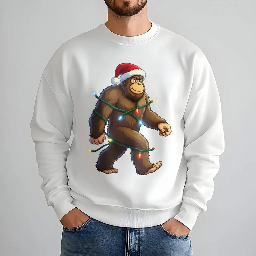 Bigfoot Christmas Sweatshirt | Funny Sasquatch Tangled in Holiday Lights | Premium Unisex Graphic Crewneck | Unique Xmas Gift for Yeti Lovers
