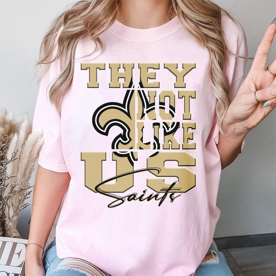 They Not Like Us Saints With New Orleans Saints Fleur-De-Lis Logo T-Shirt