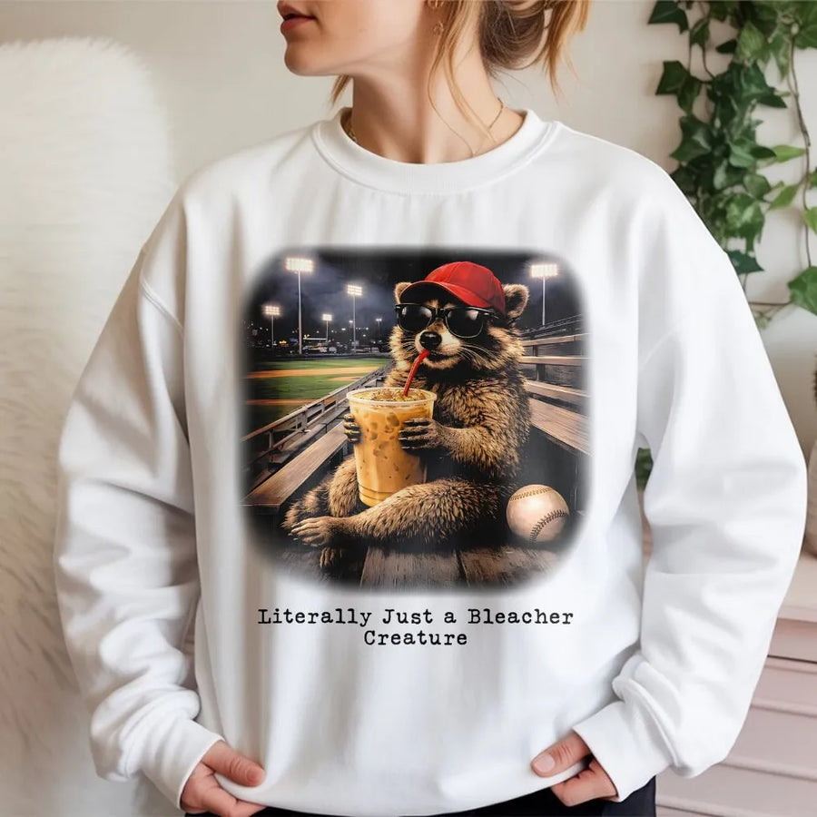 Raccoon Baseball Sweatshirt | Funny Bleacher Creature Graphic | Soft Cotton-Blend Crewneck | Coffee Lover Gift For Baseball Fans