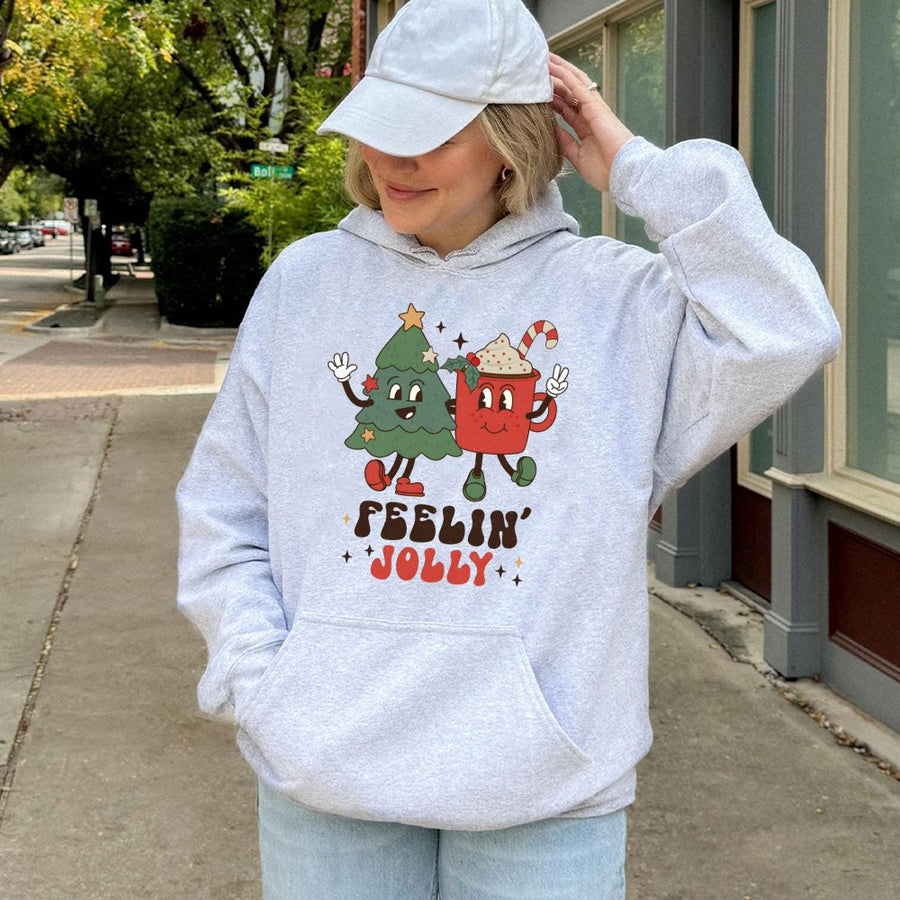 Retro Christmas Hoodie | Feelin' Jolly Tree and Cocoa Graphic | Soft Cotton-Blend Premium Quality | Festive Holiday Gift for Her